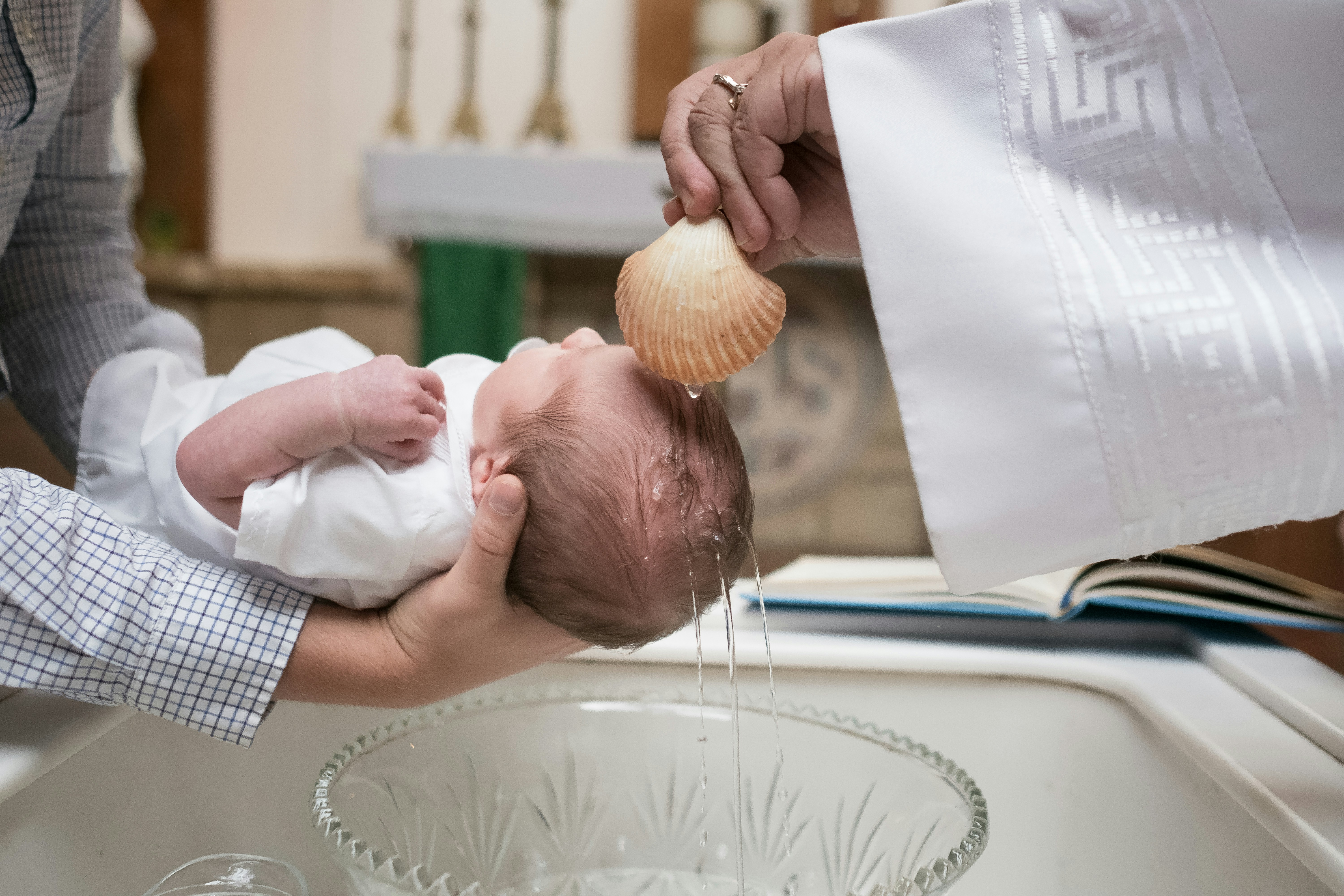 Sacred baptism ceremony performed by celebrant John Schaal in New Castle County.